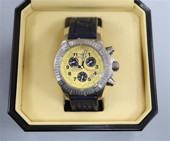 A gentlemans 2004 stainless steel Breitling Chronometre quartz wrist watch, with yellow dial and three subsidiary dials,